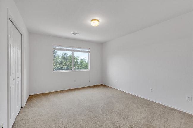 Unfurnished bedroom featuring carpet floors and a closet | Image 14