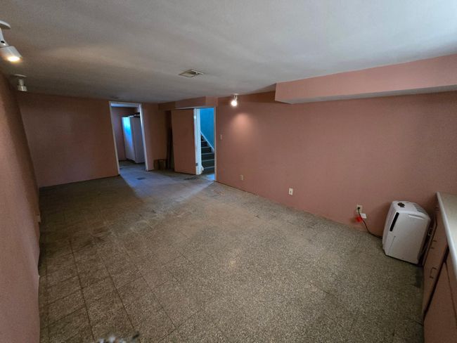 Rec room on south part of basement | Image 34