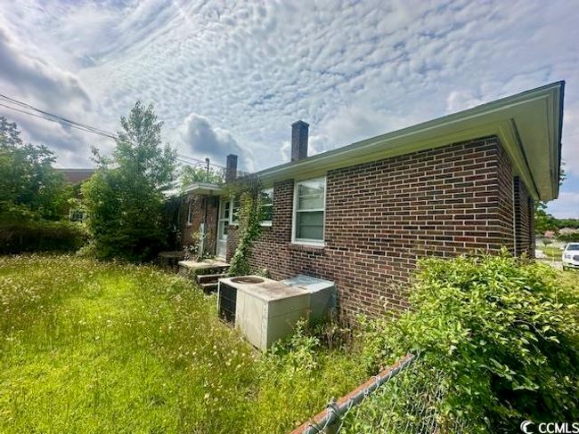 View of side of home with brick siding | Image 5