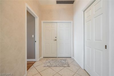 View of tiled foyer entrance | Image 2