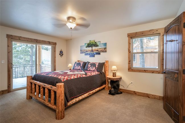 Master bedroom with deck access | Image 12