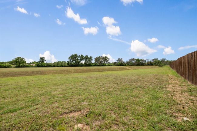 View of yard with fence and a rural view | Image 33