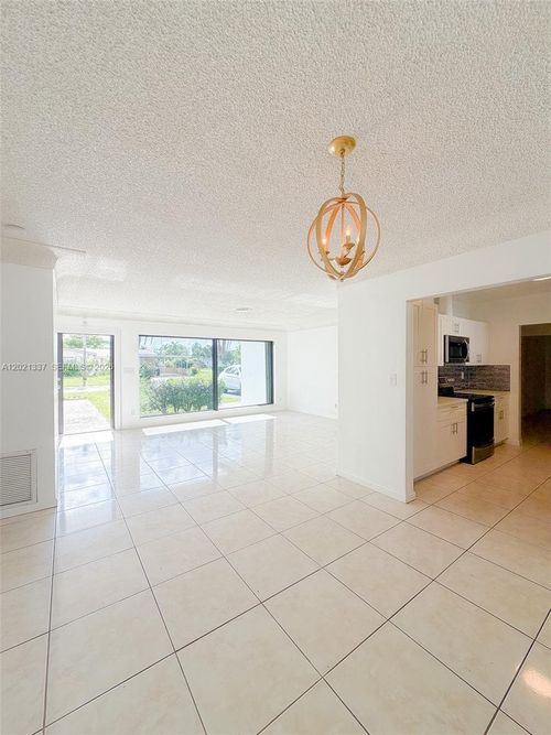 0-1650 Nw 26th Ter, Fort Lauderdale, FL, 33311-4440 | Card Image