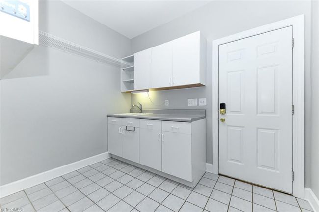 Very spacious laundry room on the main floor | Image 19
