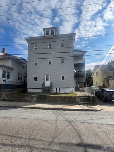 75 Winthrop Street, Home with 12 bedrooms, 4 bathrooms and 3 parking in Woonsocket RI | Image 2