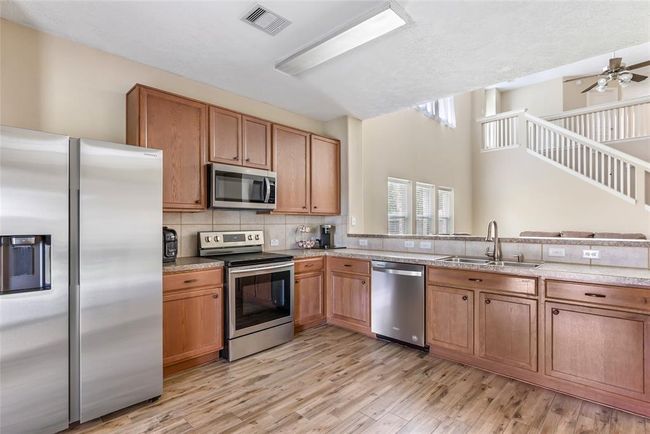 Plenty of room in the Kitchen that is open to the living area. | Image 11