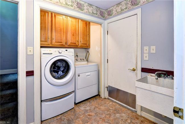 Leads out to the garage and bonus suite above | Image 18