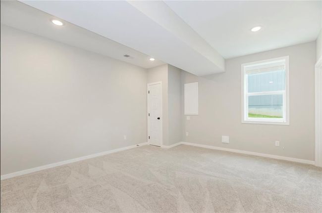 Spare room with light colored carpet, baseboards, and recessed lighting | Image 19