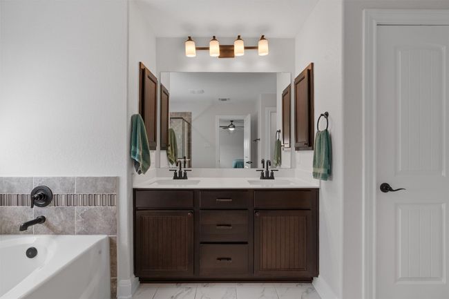 Primary Bathroom with dual vanities | Image 25