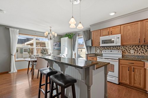 615 1st Ave Nw, Osseo, MN, 55369-1049 | Card Image