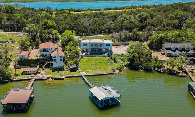 Aerial view with a water view and a wooded view | Image 6