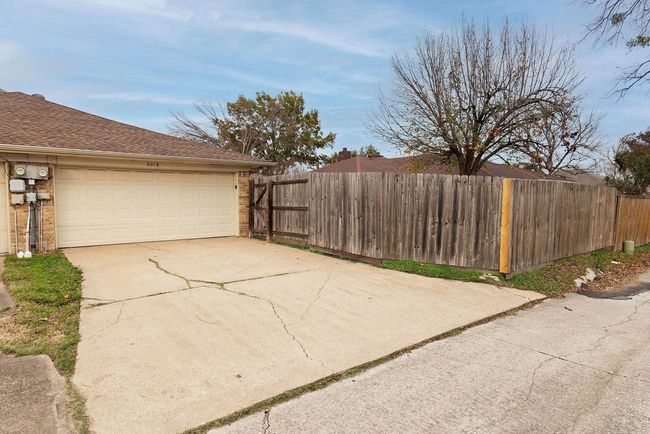 View of patio / terrace featuring concrete driveway | Image 22