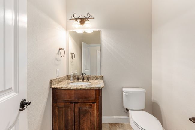 Bathroom with vanity, tile patterned flooring, and toilet | Image 29