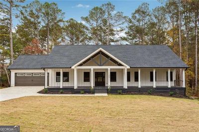 240 N Sharon Church Road, House other with 4 bedrooms, 3 bathrooms and 2 parking in Loganville GA | Image 1