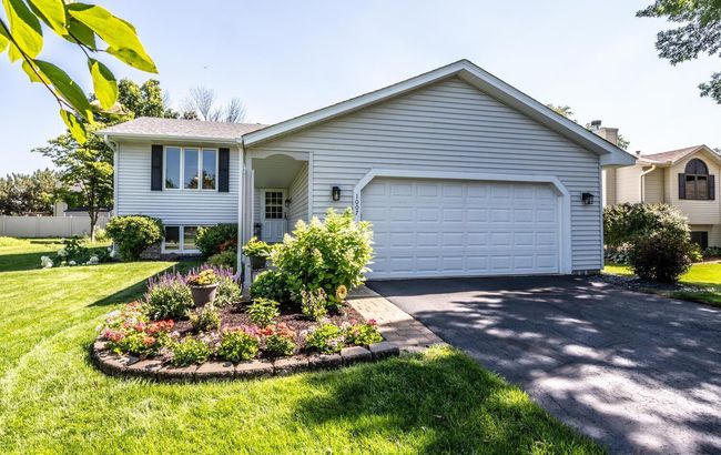 Another front photo with beautiful landscaping. | Image 37