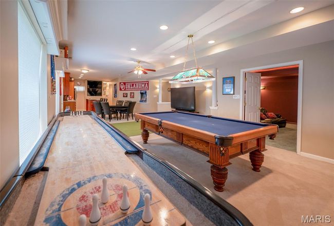 Game room with carpet, a ceiling fan, billiards table, and recessed lighting | Image 43