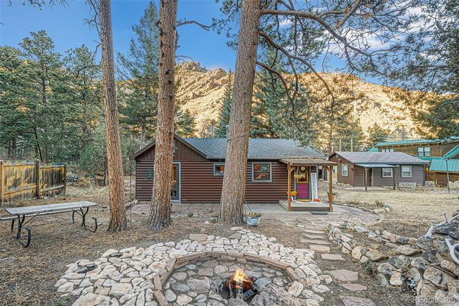 Cabin sits on a large lot. | Image 14