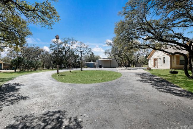 Circular drive, workshop w/ electricity &amp; carport | Image 33