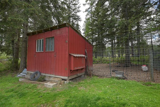 View of poultry coop with a lawn | Image 49