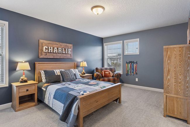 3rd of 4 upper level bedrooms also sharing the Jack and Jill bathroom | Image 25
