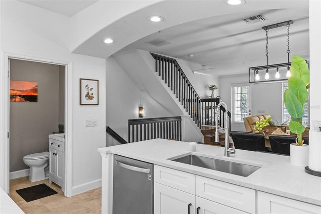 Open floor plan with Kitchen overlooking living room | Image 9
