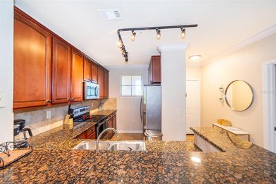 1026 - 909 Charo Parkway, Condo with 4 bedrooms, 3 bathrooms and null parking in Davenport FL | Image 2