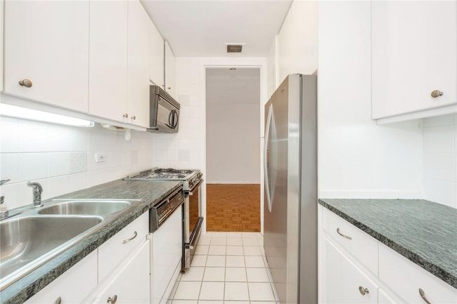 Kitchen with door to Living Room | Image 4