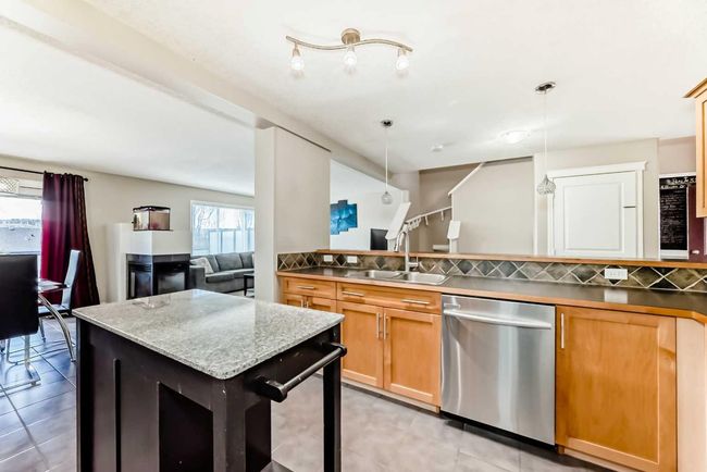 66 Evansbrooke Terr Nw, House other with 5 bedrooms, 4 bathrooms and 4 parking in Calgary AB | Image 6