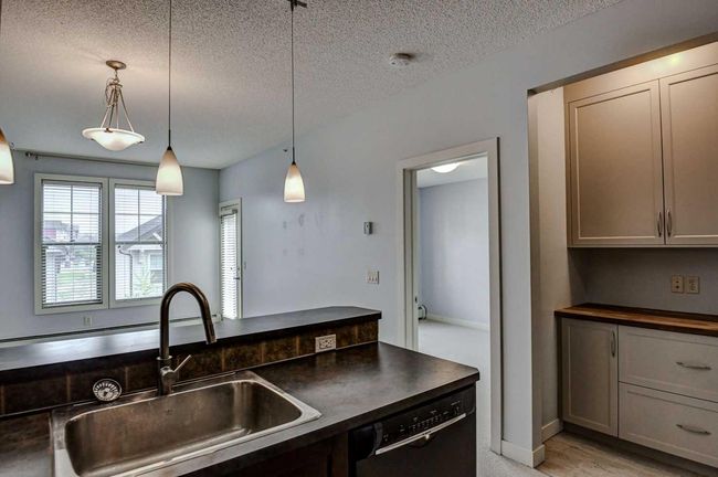 412 - 201 Sunset Dr, Condo with 1 bedrooms, 1 bathrooms and 2 parking in Cochrane AB | Image 5