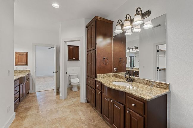 Full bath featuring vanity and toilet | Image 34