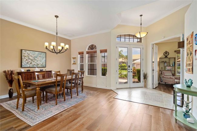 French oak wire brushed hardwood floors throughout, adjacent front den, dining, & formal living room. | Image 5