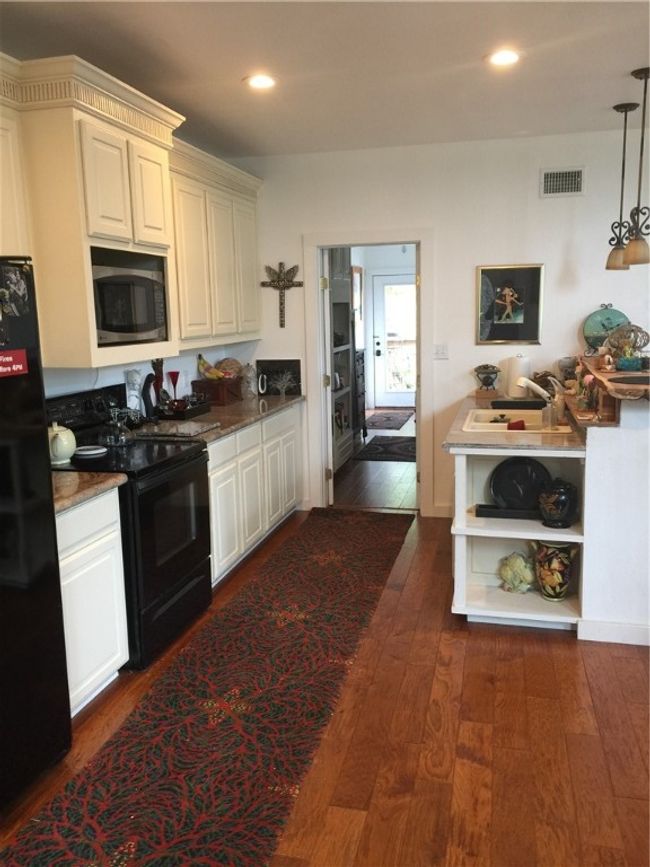 Kitchen with mud room, pantry, laundry, 1/2 bath. | Image 9