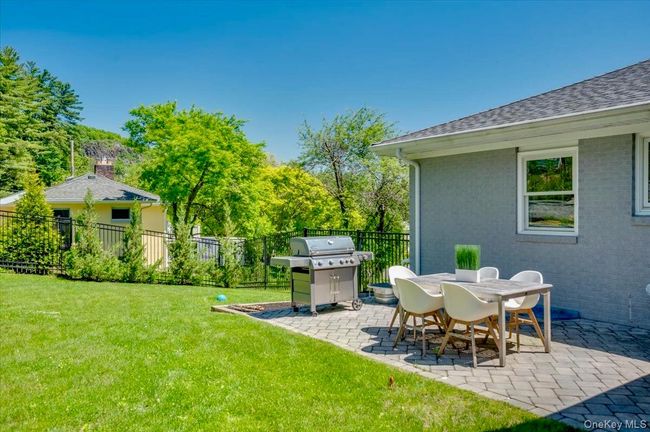 View of yard with a patio area | Image 38