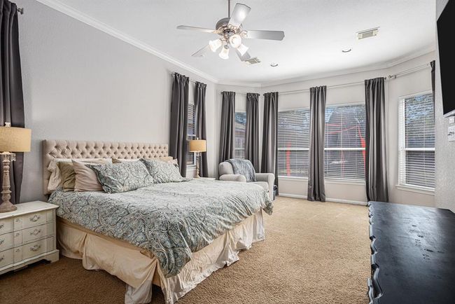 Primary bedroom with large windows and natural light | Image 20