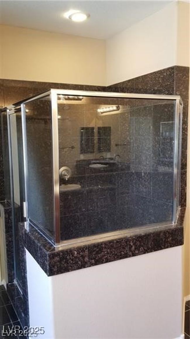 Bathroom with a shower stall | Image 20