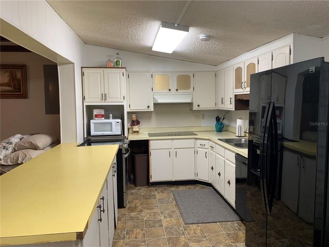 24605 Ne 177 Th Ter, House other with 3 bedrooms, 2 bathrooms and null parking in Fort Mc Coy FL | Image 35