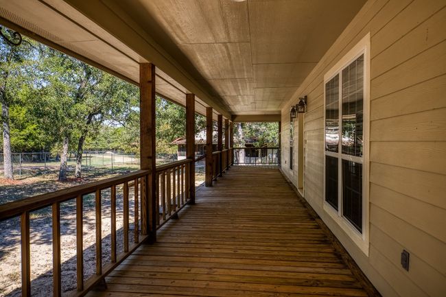 screened porch on main house | Image 11