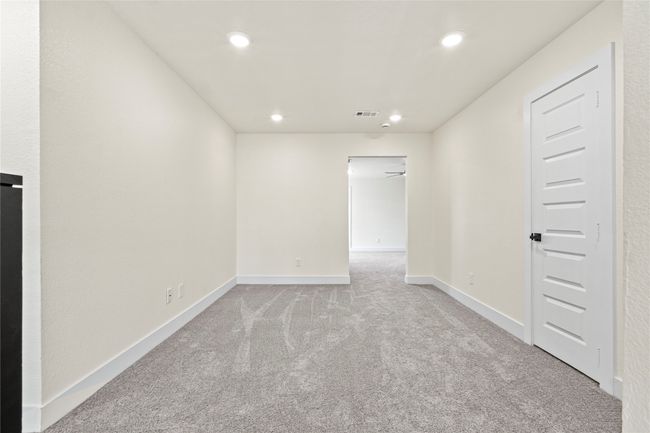 Spare room with light colored carpet and recessed lighting | Image 14