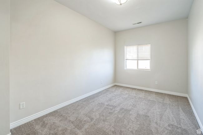 Empty room with carpet and baseboards | Image 34