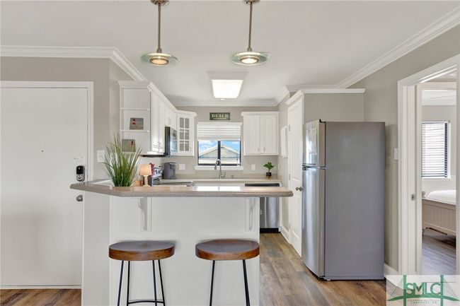 Updated Kitchen with Stainless Steel Appliances & Breakfast Bar | Image 10