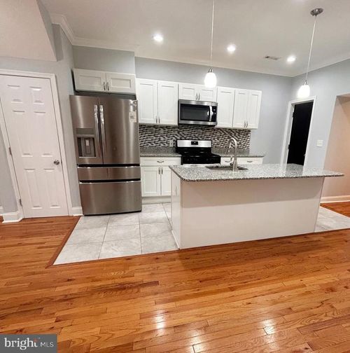 1913 E 29th St, BALTIMORE, MD, 21218-3136 | Card Image
