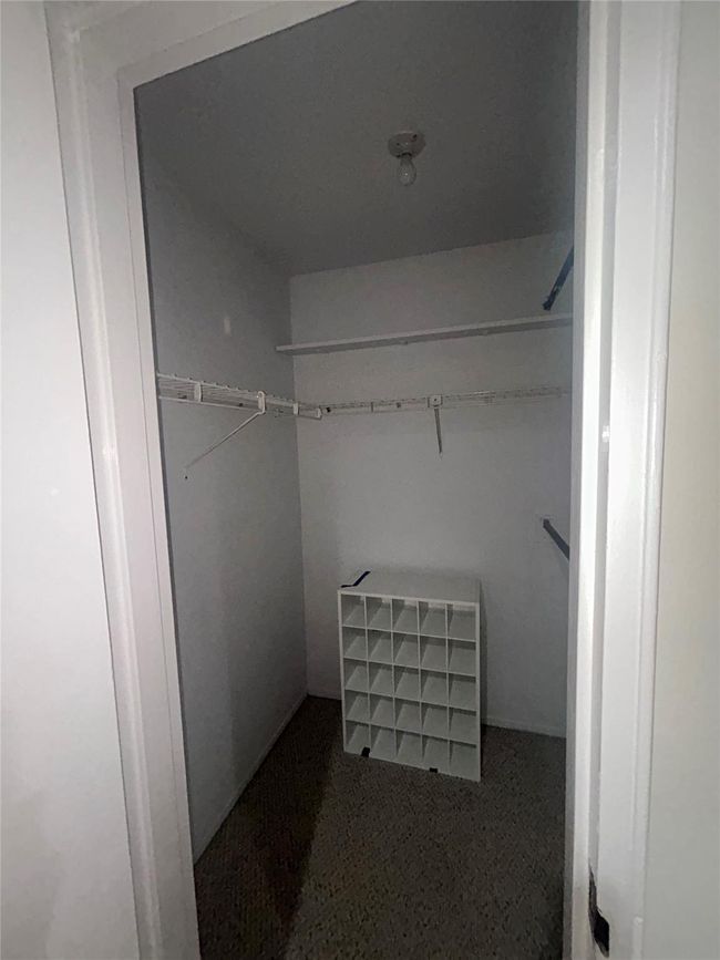 View of spacious closet | Image 10