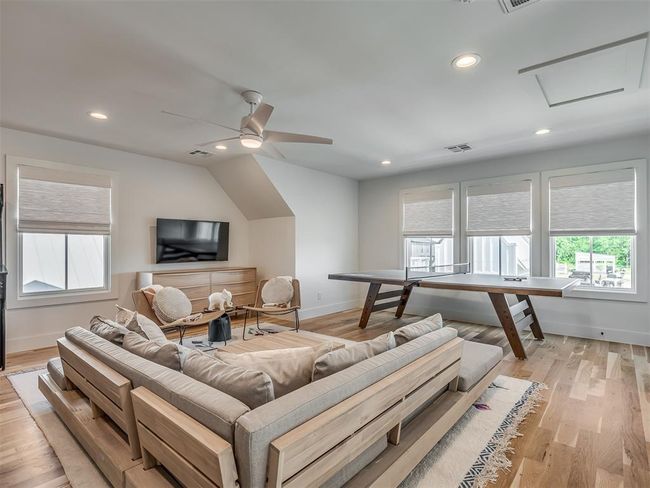Living room with plenty of natural light, attic access, recessed lighting, baseboards, and ceiling fan | Image 36