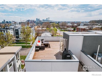 ith the electric atmosphere of Empower Field at Mile High in the background, this is the perfect setting to fire up the grill, crack open some cold drinks, and cheer on the Broncos! | Image 1