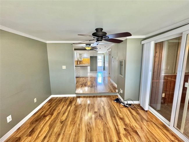 Living room towards dinette and kitchen | Image 8