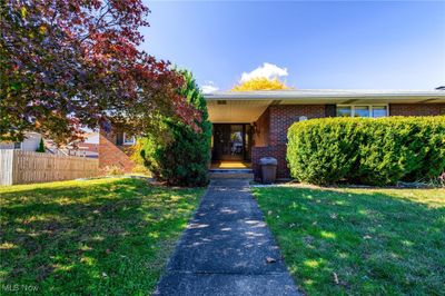 View of front facade with a front lawn | Image 2