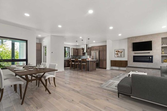 Great Room w Gas Fireplace and Kitchen virtually furnished | Image 7