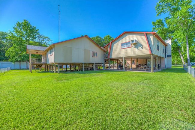 Notice your own private covered back porch hang out area | Image 20