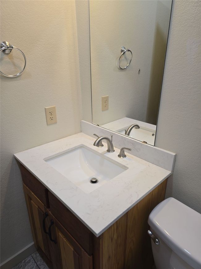 Bathroom with vanity and toilet | Image 26