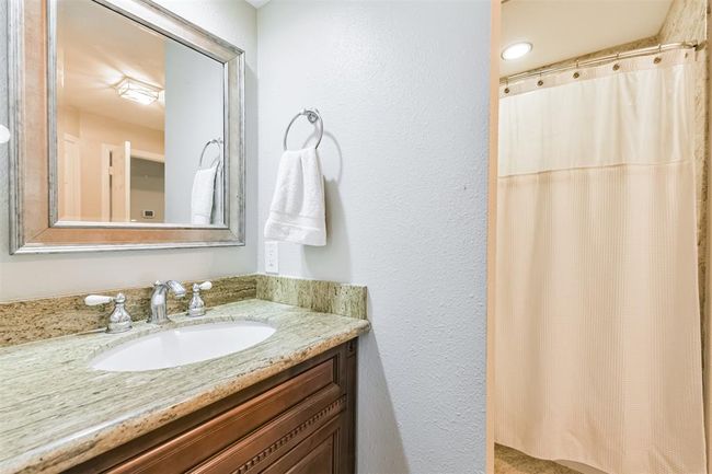 Jack and Jill bathroom located between bedrooms 2 & 3. | Image 34